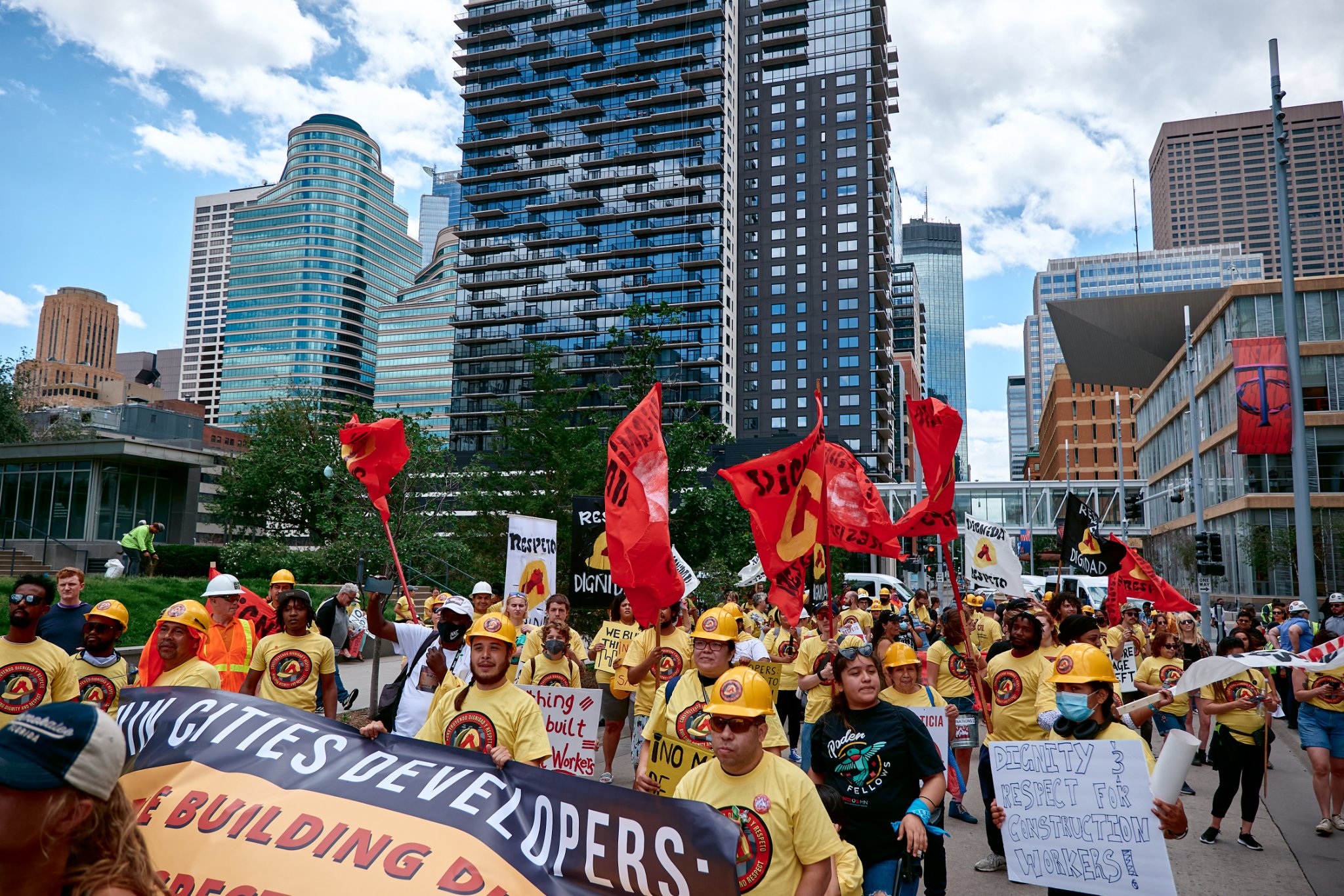 A group of people marching wearing CTUL BDR shirts