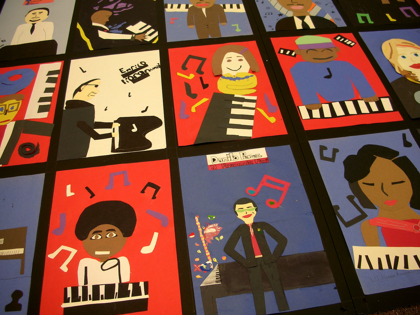 Construction paper portraits of jazz artists